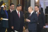 Xi and Putin Present United Front Against West on Victory Day Eve