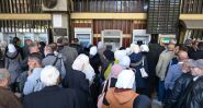 Syria: Hours of Waiting… for a Few Dollars
