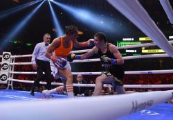 Boxe: Taylor conserve son titre en battant Serrano