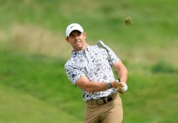 Golf: McIlroy premier leader ex-aequo de l'US Open grâce à une carte de 67