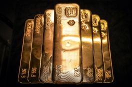 Le dollar glisse et l'or monte face à l'incertitude douanière