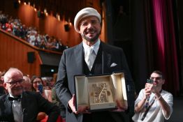 Cannes: Palme d'or d'honneur pour John Travolta, icône du cool hollywoodien