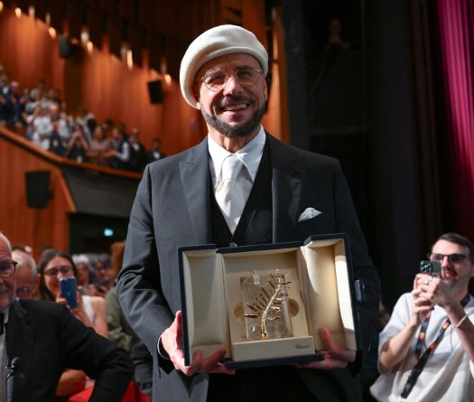 Cannes: Palme d'or d'honneur pour John Travolta, icône du cool hollywoodien