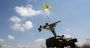 Trading Arms for Power: Hezbollah’s Political Bargain