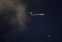 Israeli Airstrikes Hit Central Iran: Deaths Reported in Qom, Explosions in Isfahan